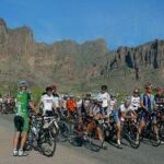 A group of people on bicycles.