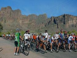 A group of people on bicycles.