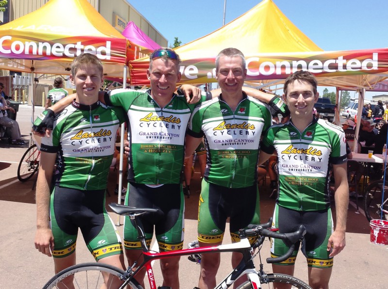 A group of men wearing cycling uniforms.