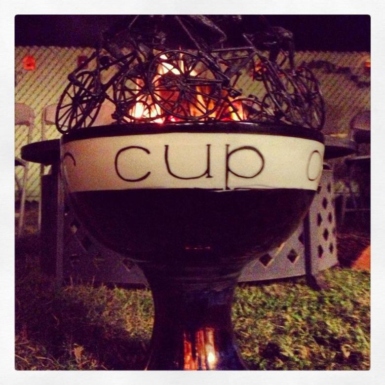 A fire bowl with the word cup on it.