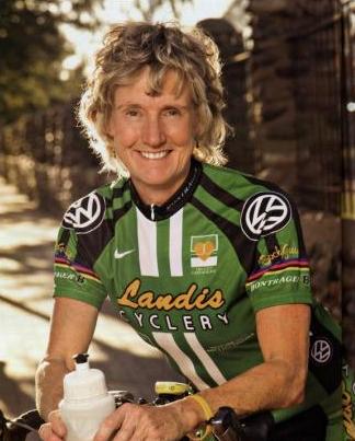 A woman in a green jersey.